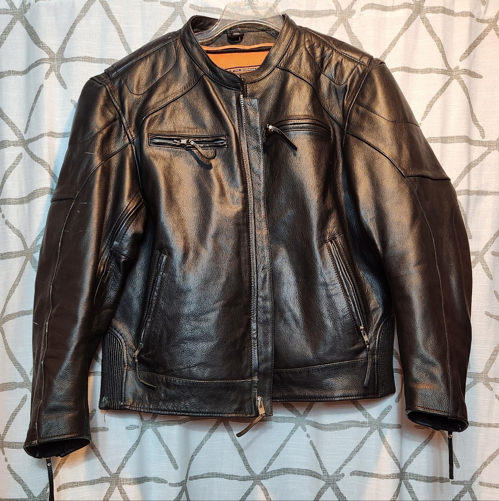 First Classics Black pebbled leather motorcycle jacket.